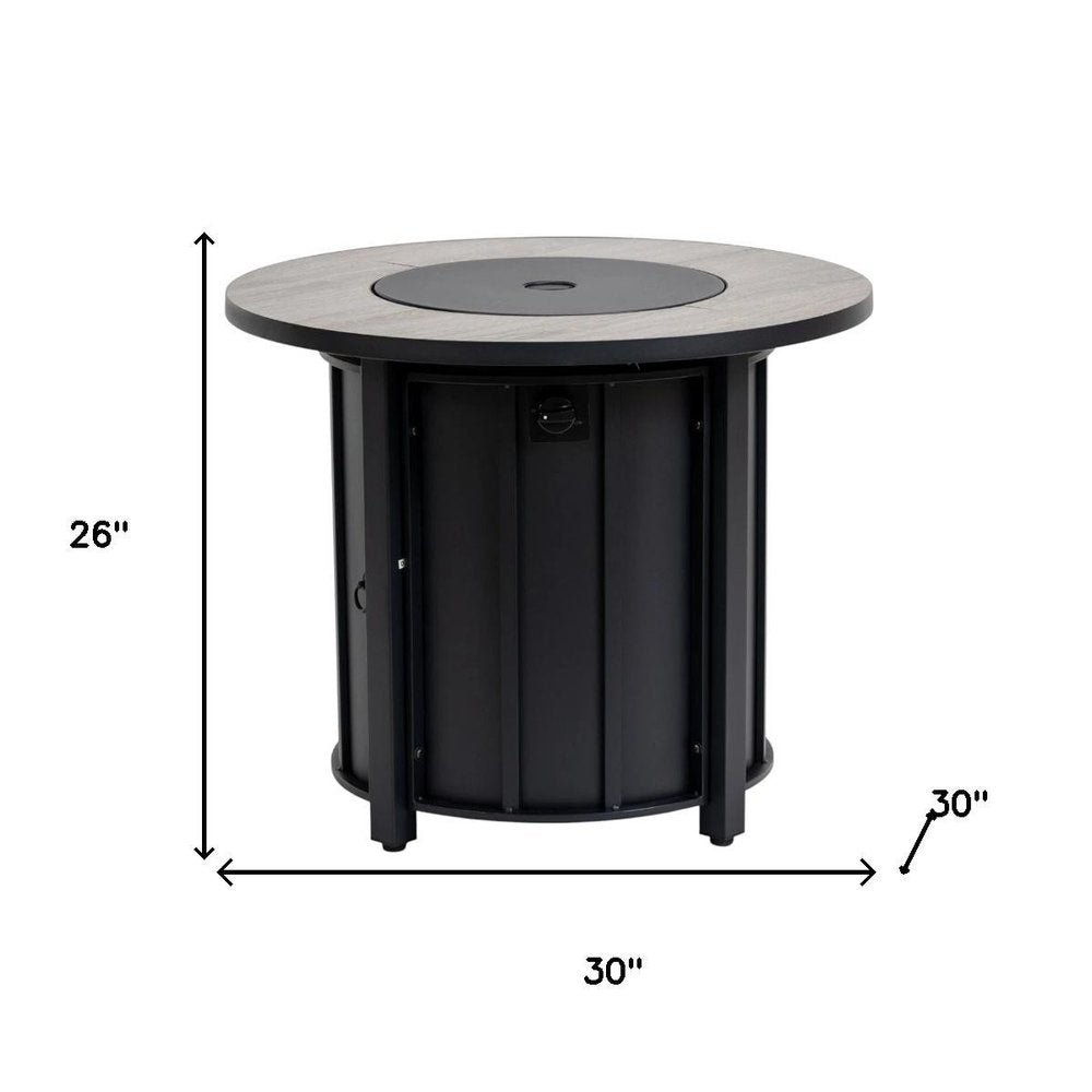50000 BTU 30" Black Steel Propane Column Fire Pit With Cover. Outdoor fireplaces and firepit isolated on a plain white background, in a black metal finish.