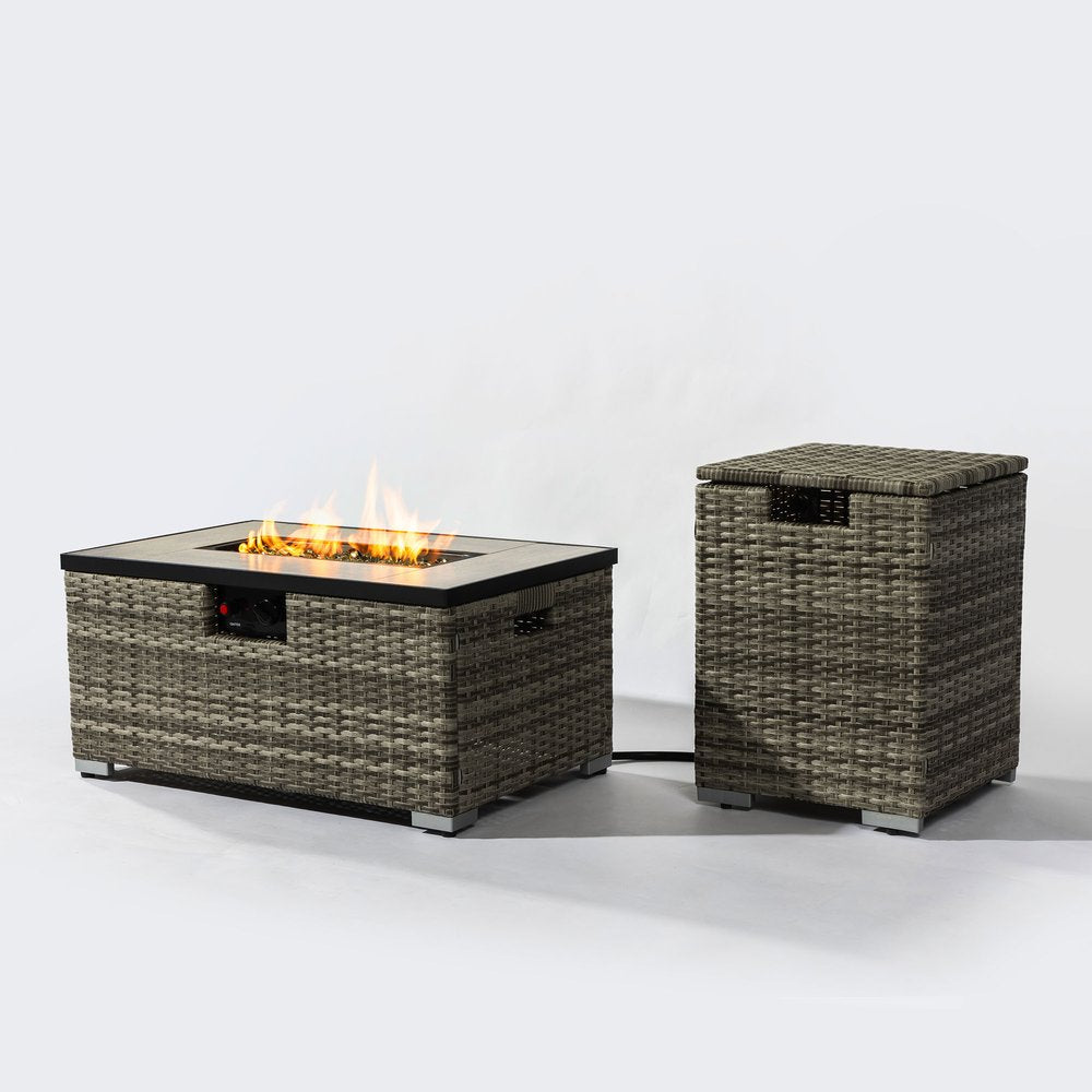 Rectangular beige wicker propane fire pit with a matching cover on a white background.