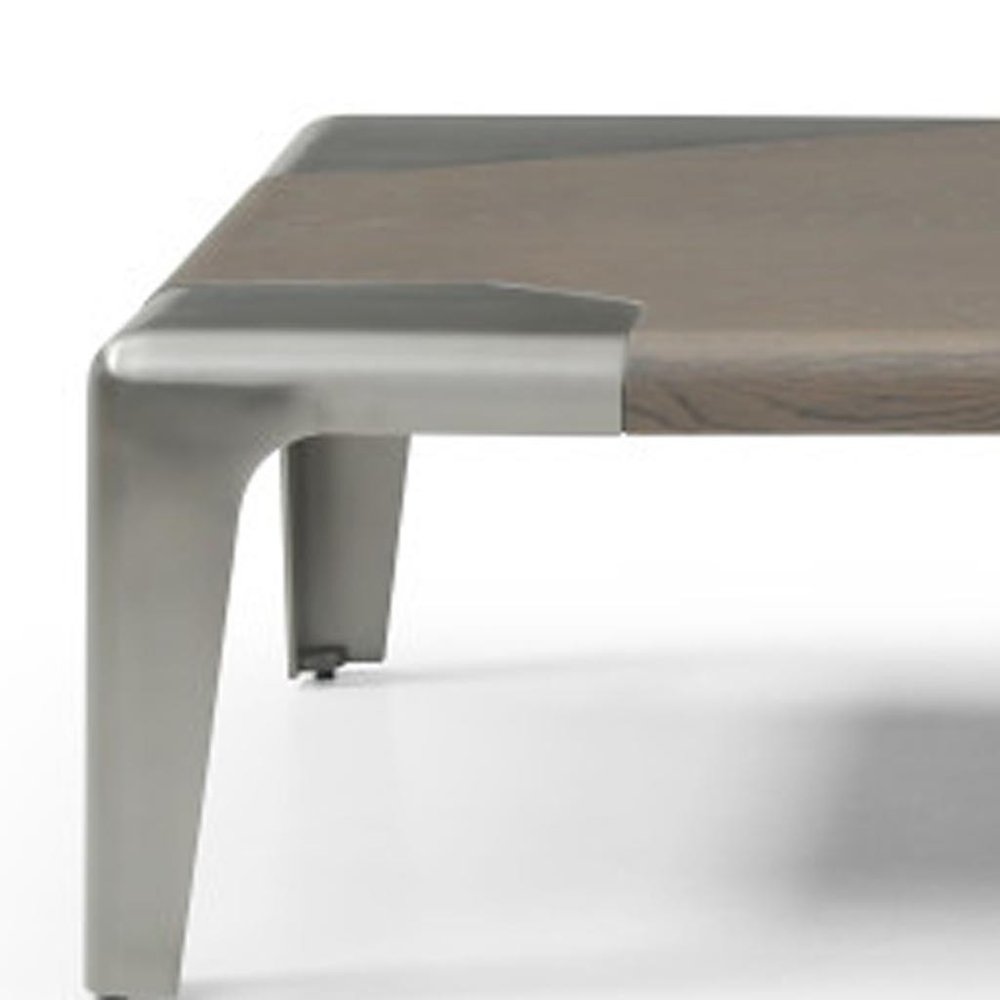 57" Light Gray and Silver Wood and Stainless Steel Coffee Table. Coffee table isolated on a plain white background, finished in light gray metal.