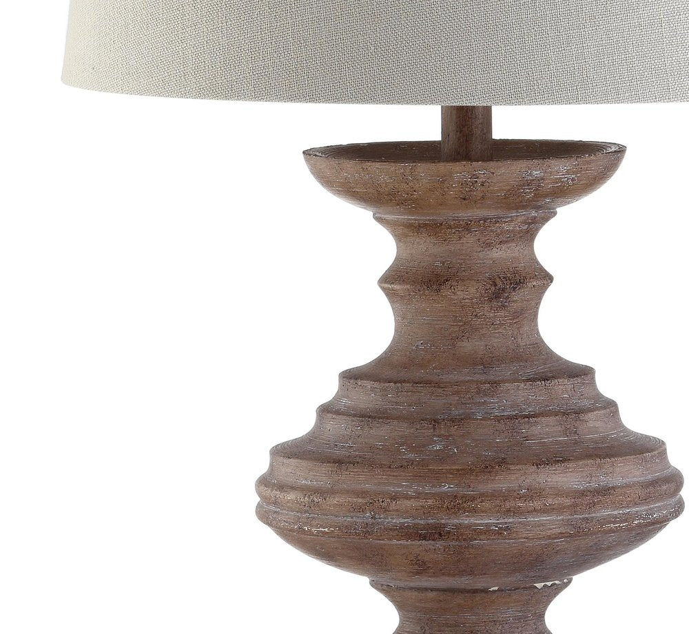 27" Brown Urn Bedside Lamp With Drum Shade. Lamp isolated on a plain white background, in a brown finish.