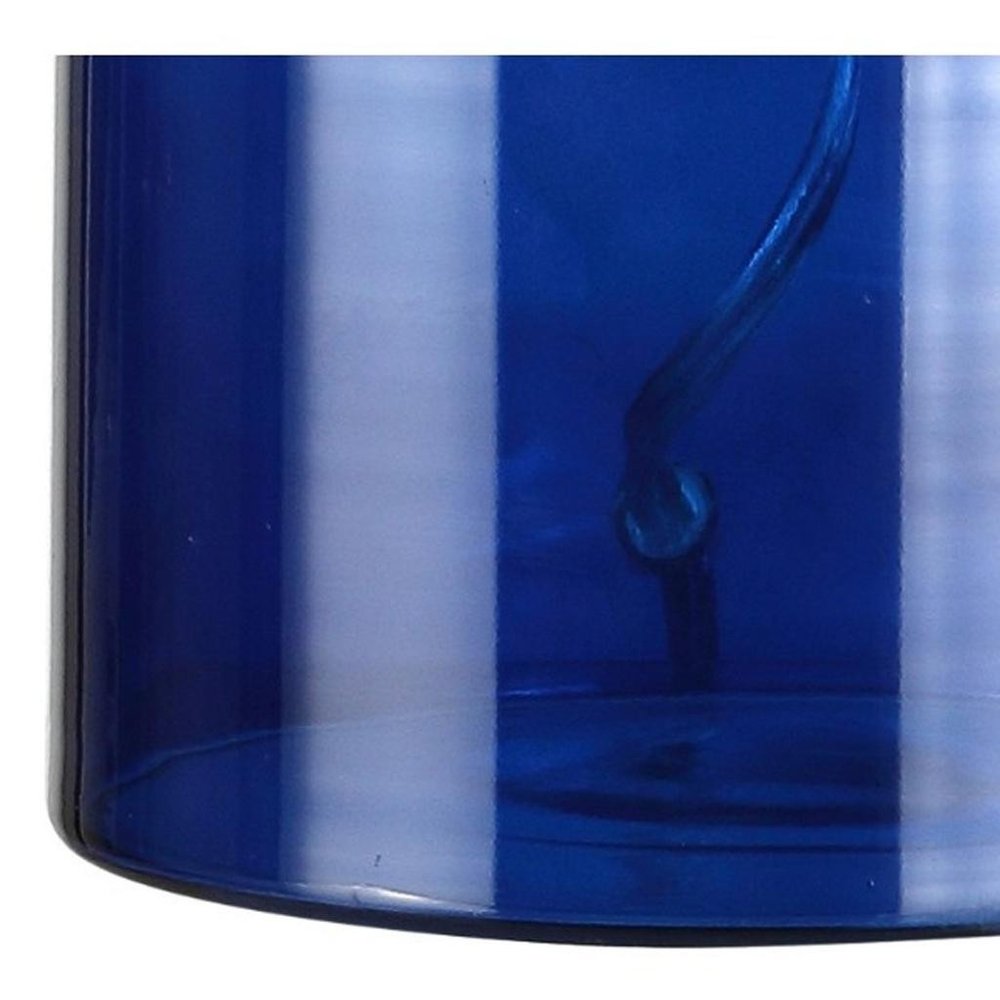 24" Clear Novelty Table Lamp With Drum Shade. Table lamp isolated on a plain white background.