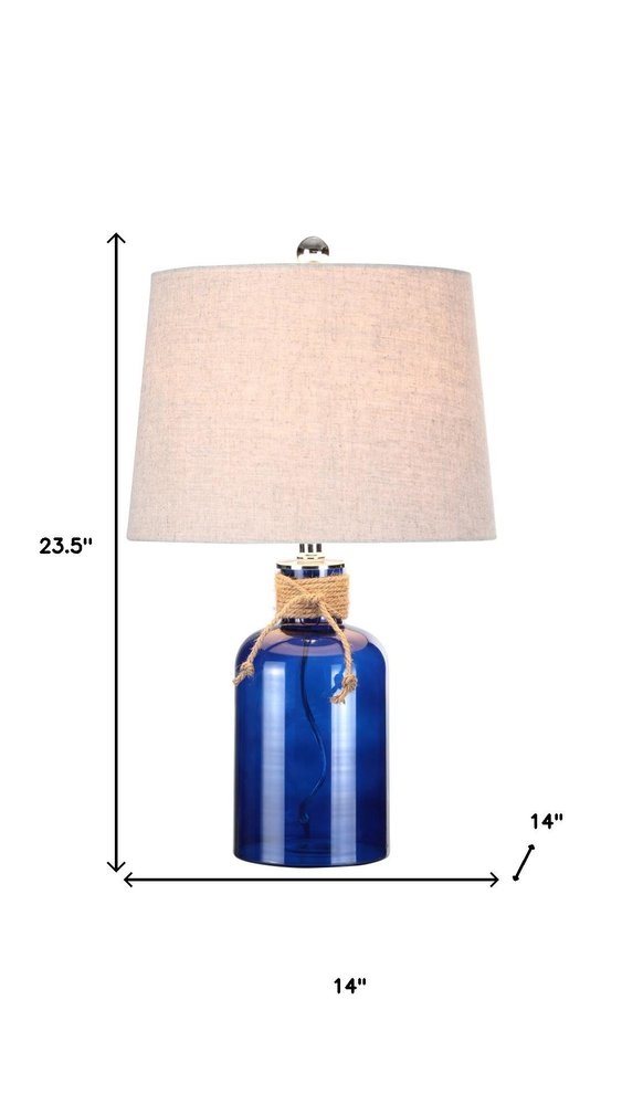 24" Clear Novelty Table Lamp With Drum Shade. Table lamp isolated on a plain white background.