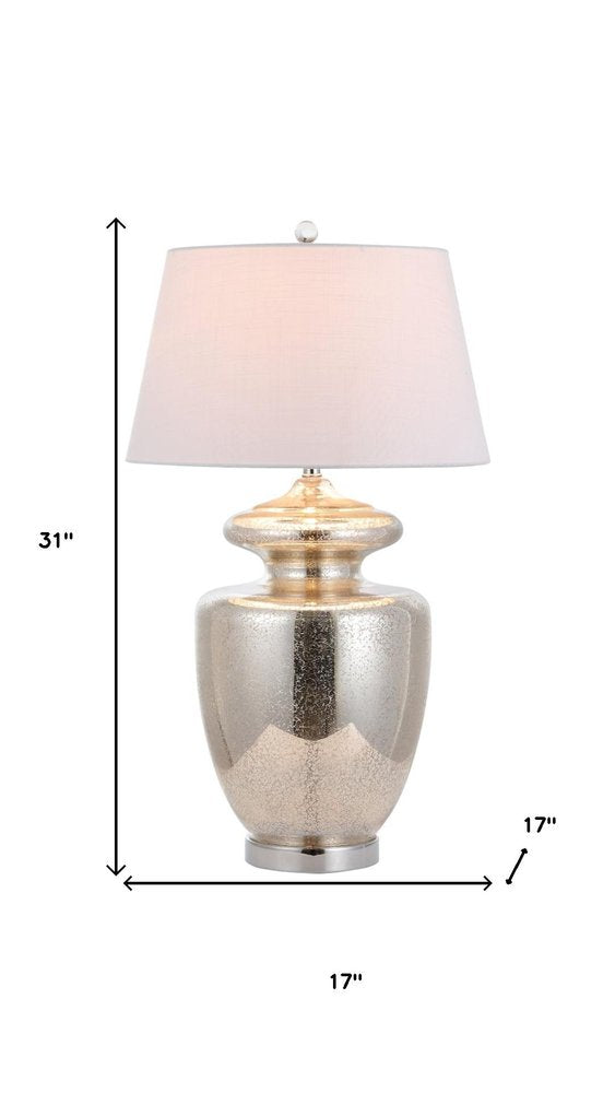 31" Silver Novelty Table Lamp With Drum Shade. Table lamp isolated on a plain white background, in a silver finish.