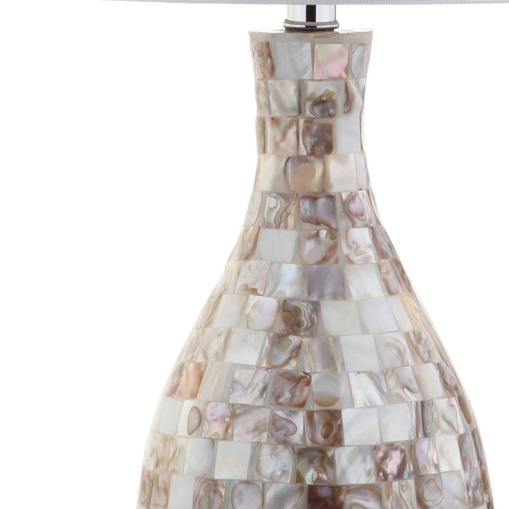 27" Ivory And Beige Novelty Table Lamp With Drum Shade. Table lamp isolated on a plain white background, showing its ivory color.