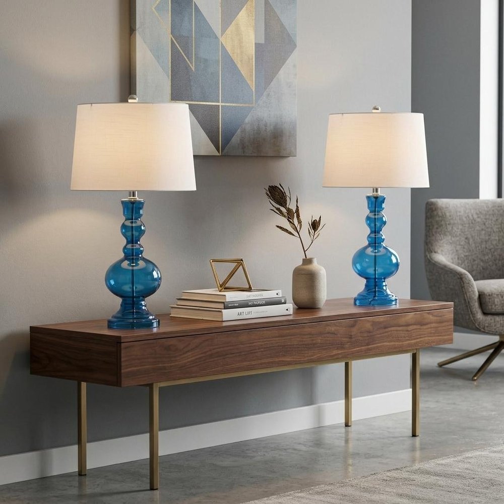 Set of Two 29" Blue Curved Body Glass Table Lamps With Drum Shades in a home interior