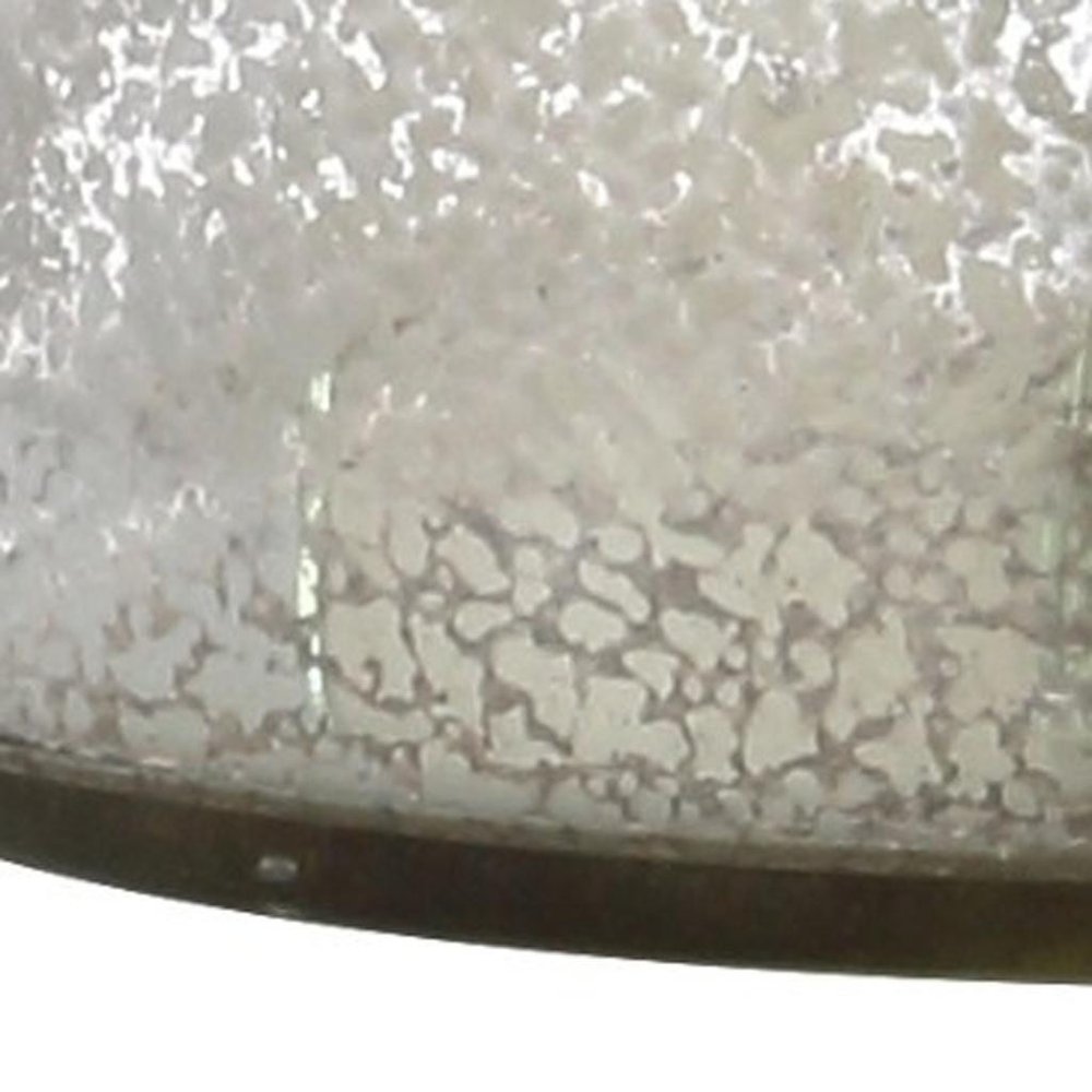 Cropped view of 25" Clear Table Lamp With Drum Shade focusing on the clear surface.