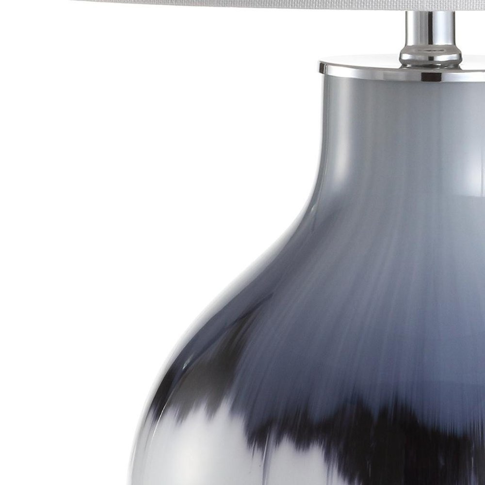 27" Silver Novelty Table Lamp With Globe Shade. Table lamp isolated on a plain white background, showing its silver color.