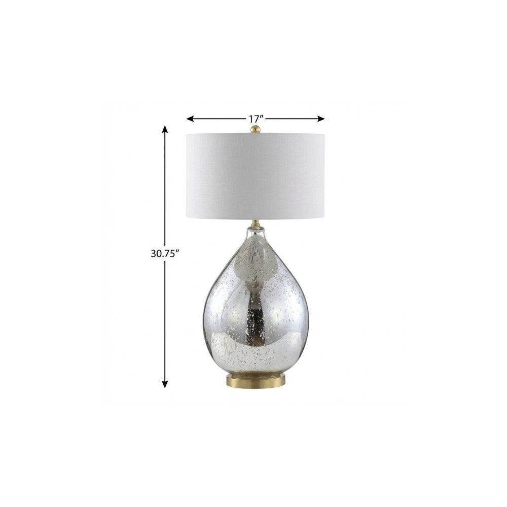 31" Gold Novelty Table Lamp With Globe Shade. Table lamp isolated on a plain white background.