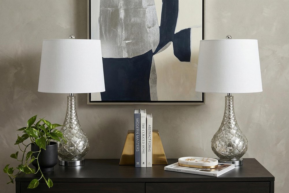 Set of Two 26" Silver Novelty Table Lamps With Drum Shades in a home interior