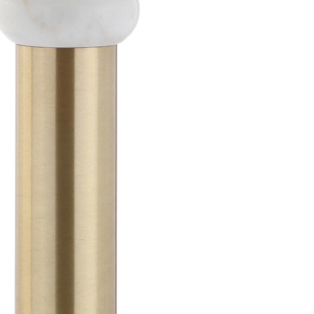 27" Gold Novelty Table Lamp With Drum Shade. Table lamp isolated on a plain white background, showing its gold color.