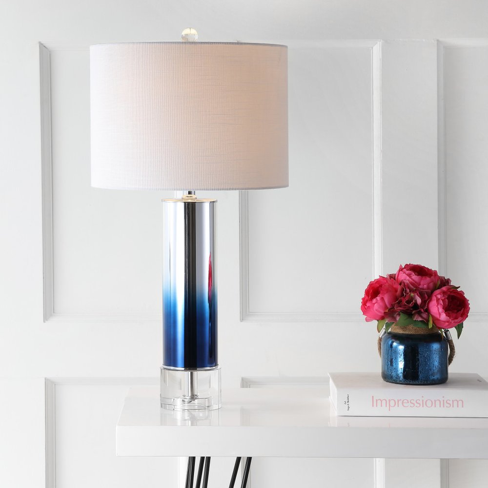 27" Clear Novelty Table Lamp With Drum Shade. Table lamp isolated on a plain white background, showing its clear color.