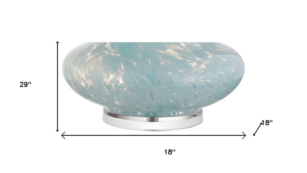 29" Light Blue And Clear Teardrop Glass Table Lamp With Drum Shade. Table lamp isolated on a plain white background, finished in blue glass.