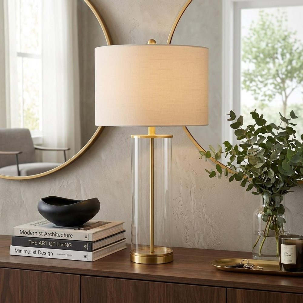 29" Gold Table Lamp With Drum Shade. Table lamp in gold.