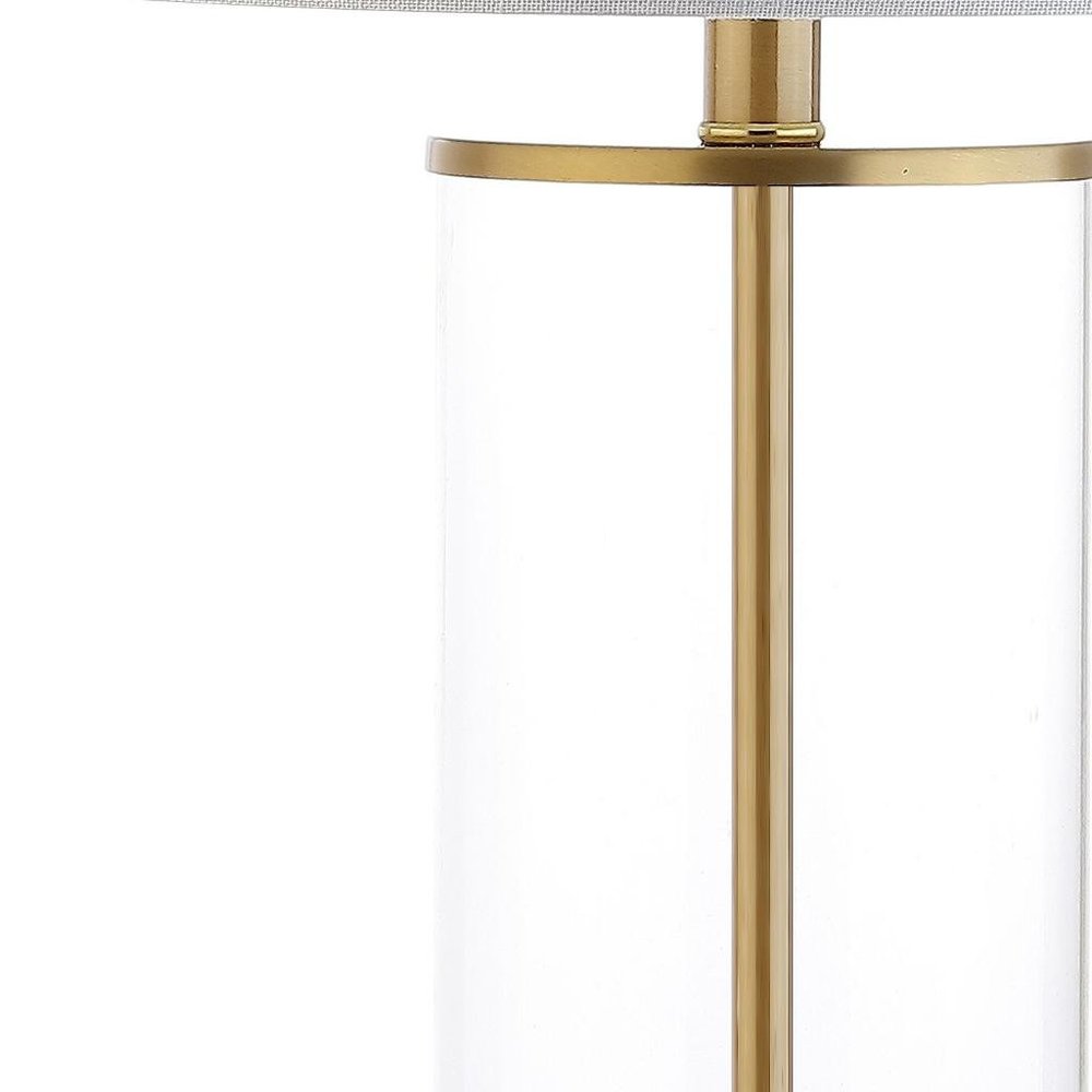 29" Gold Table Lamp With Drum Shade. Table lamp isolated on a plain white background, in a gold finish.
