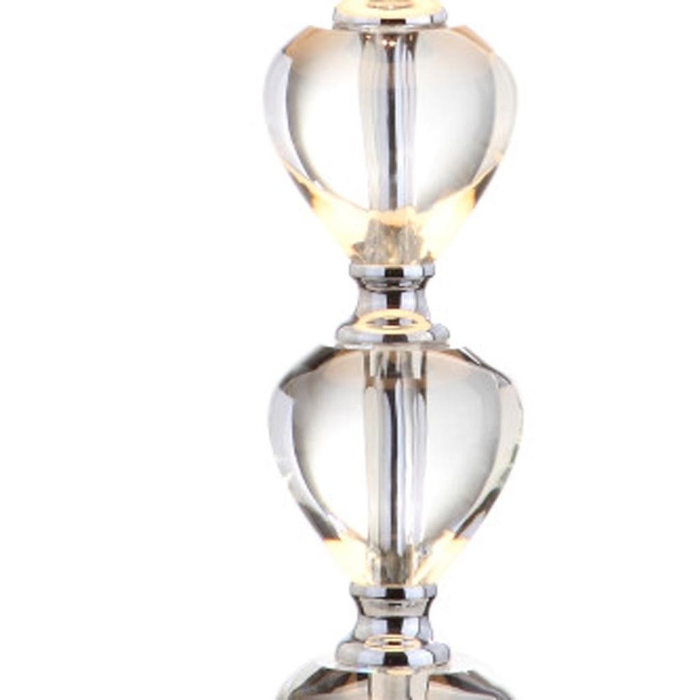 27" Silver Globe Table Lamp With Drum Shade. Table lamp isolated on a plain white background, showing its silver color.