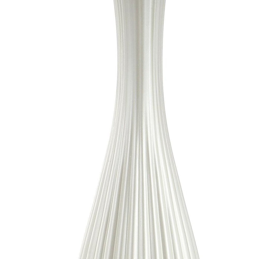 34" Gold Novelty Table Lamp With Globe Shade. Table lamp isolated on a plain white background.