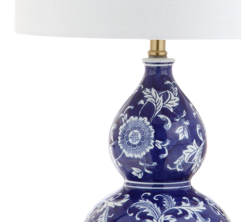 27" Blue Gold And White Novelty Table Lamp With Drum Shade. Table lamp isolated on a plain white background, finished in white.