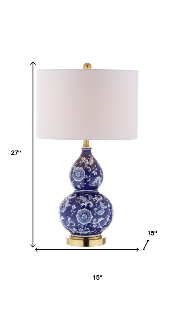 27" Blue Gold And White Novelty Table Lamp With Drum Shade. Table lamp isolated on a plain white background, in a white finish.