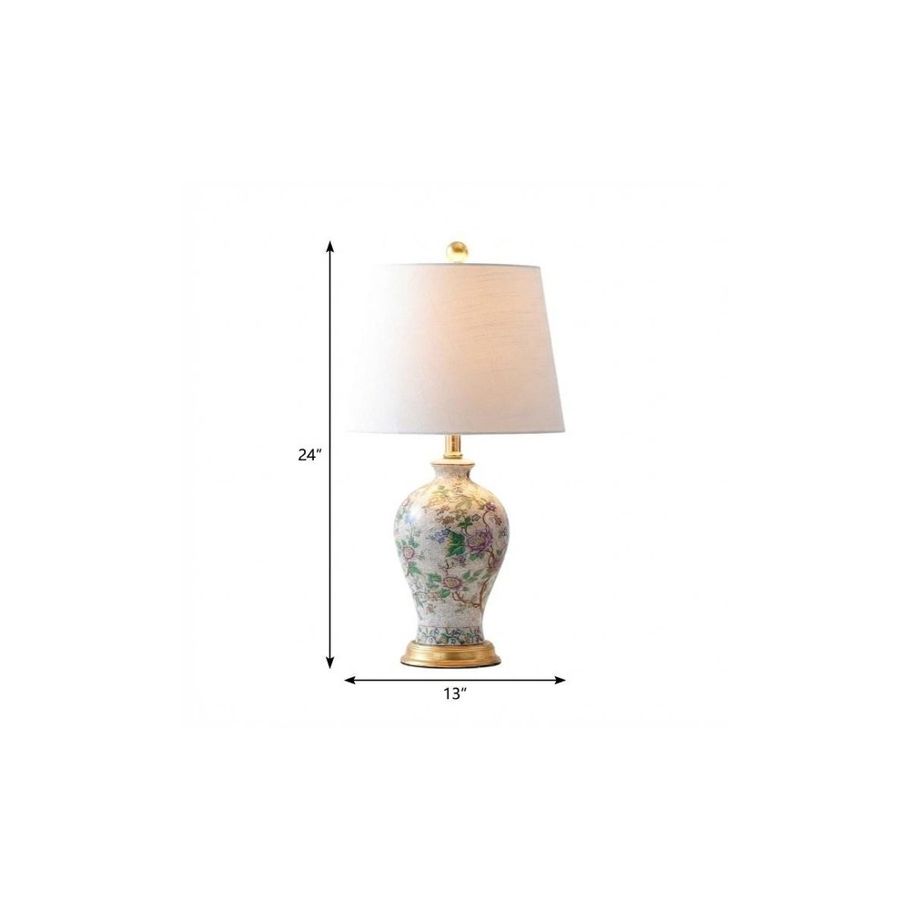 24" Gold And Off White Urn Table Lamp With Empire Shade. Table lamp isolated on a plain white background, showing its off-white color.