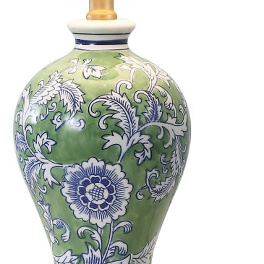 24" Green And Gold Urn Table Lamp With Empire Shade. Table lamp isolated on a plain white background, finished in green.
