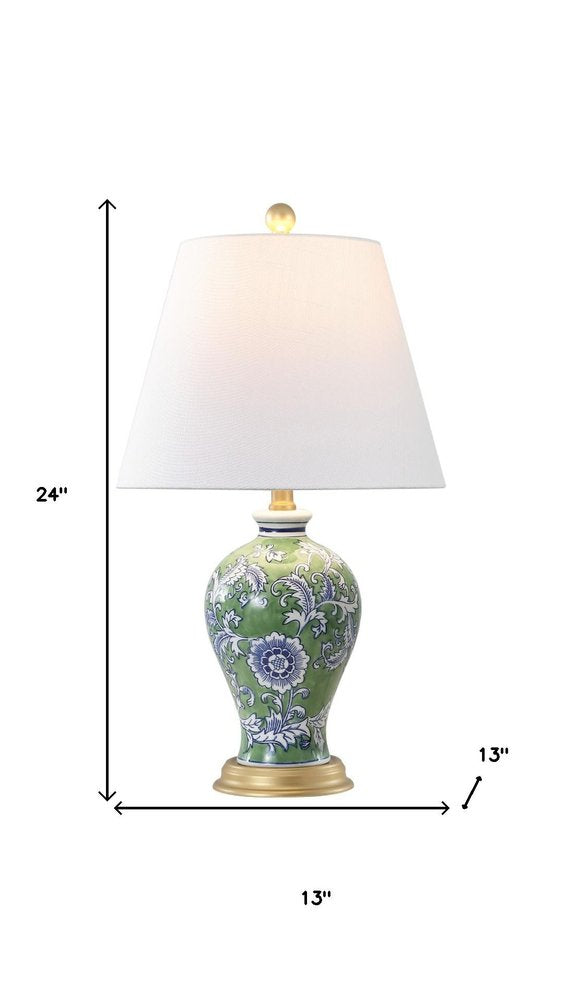 24" Green And Gold Urn Table Lamp With Empire Shade. Table lamp isolated on a plain white background.