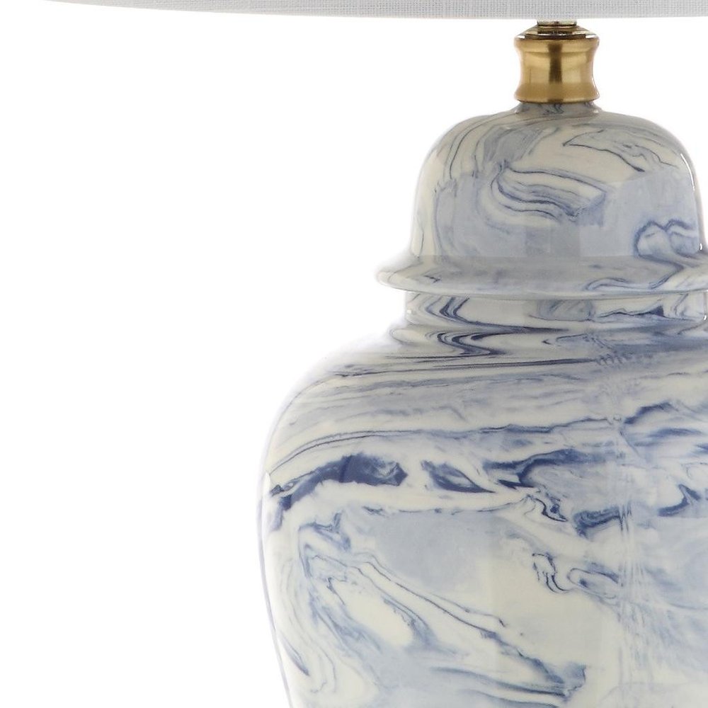 26" Gold Novelty Table Lamp With Drum Shade. Table lamp isolated on a plain white background.
