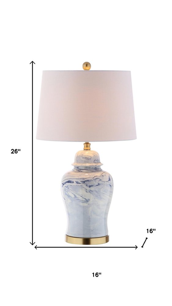 26" Gold Novelty Table Lamp With Drum Shade. Table lamp isolated on a plain white background.