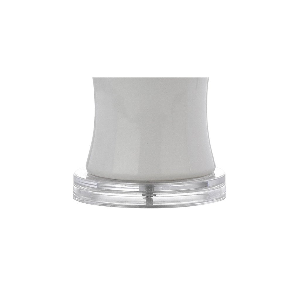 27" Clear Table Lamp With Drum Shade. Table lamp isolated on a plain white background, in a clear finish.