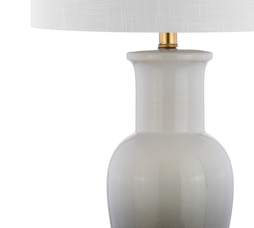 32" Gold Novelty Table Lamp With Drum Shade. Table lamp isolated on a plain white background.