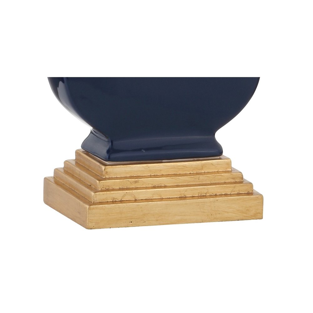 29" Gold Novelty Table Lamp With Drum Shade. Table lamp isolated on a plain white background, showing its gold color.