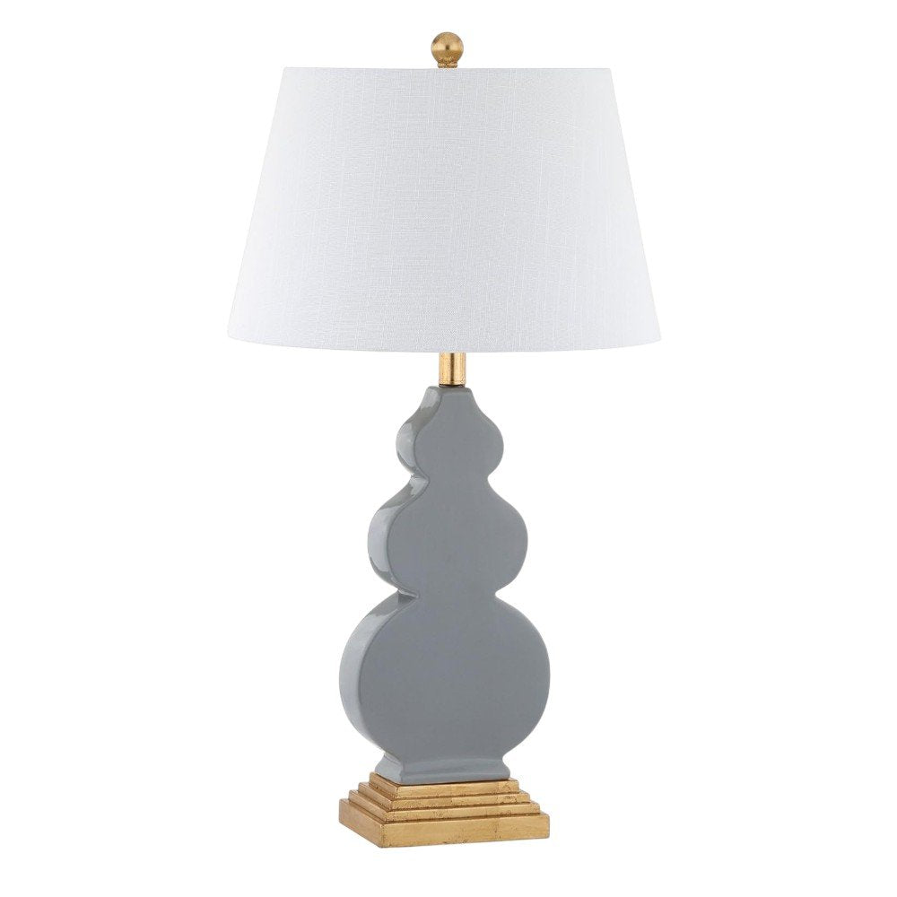 29" Gold Novelty Table Lamp With Drum Shade. Table lamp isolated on a plain white background, finished in gold.