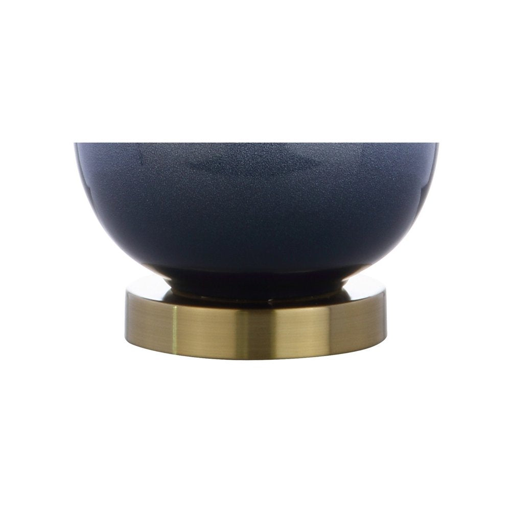 25" Gold Novelty Table Lamp With Drum Shade. Table lamp isolated on a plain white background, in a gold finish.
