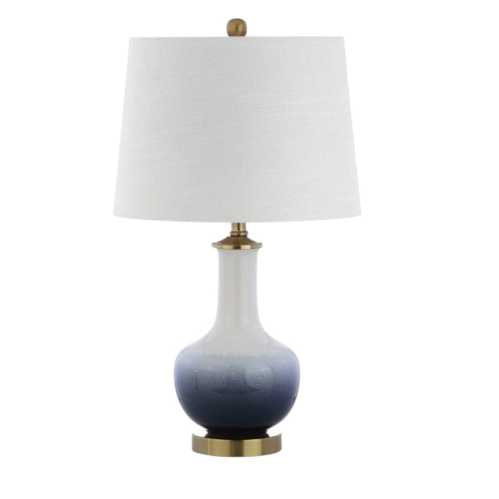 25" Gold Novelty Table Lamp With Drum Shade. Table lamp isolated on a plain white background.