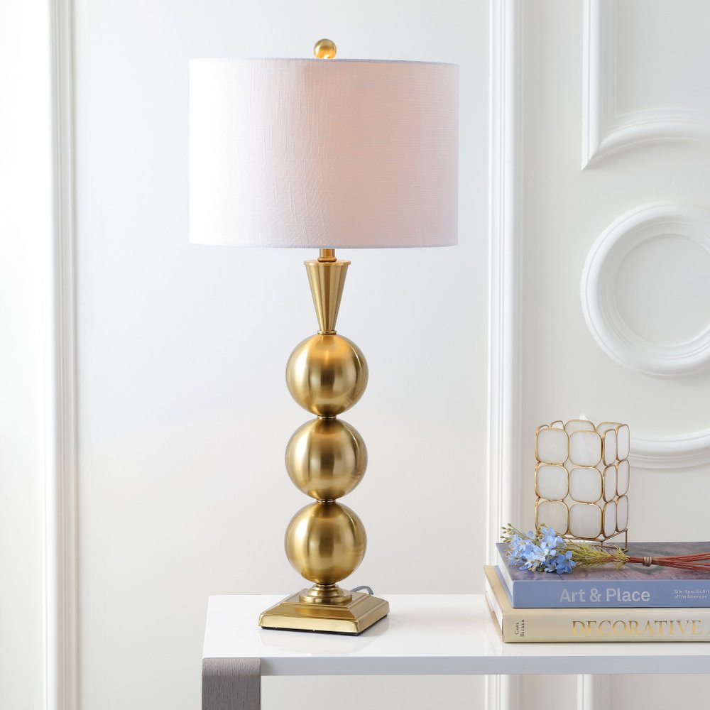 33" Gold Novelty Table Lamp With Drum Shade. Table lamp isolated on a plain white background.