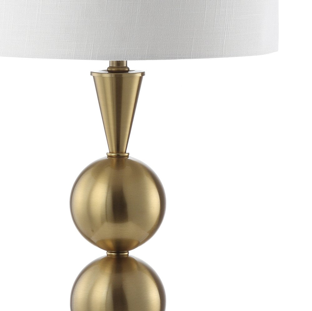 33" Gold Novelty Table Lamp With Drum Shade. Table lamp isolated on a plain white background, finished in gold.