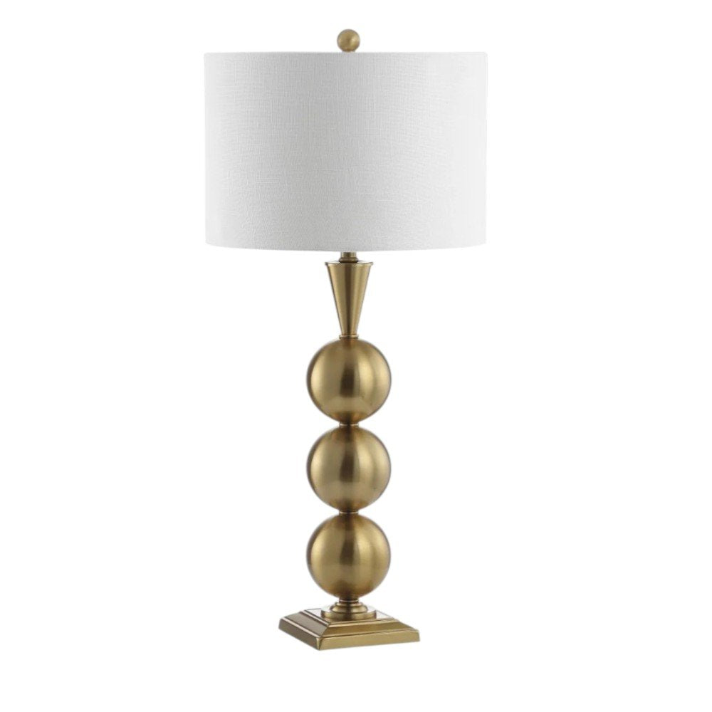 33" Gold Novelty Table Lamp With Drum Shade. Table lamp isolated on a plain white background, finished in gold.
