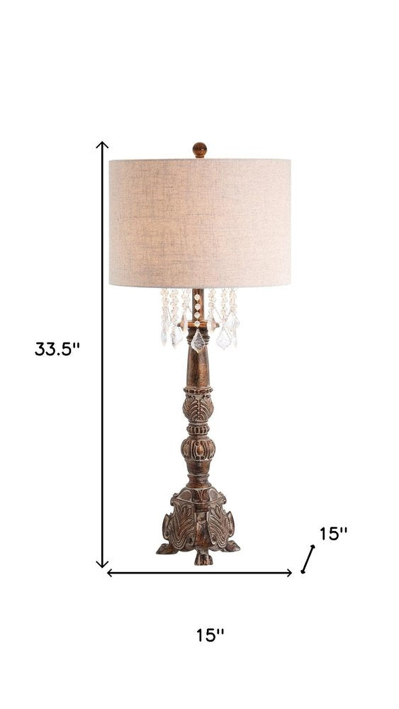 34" Brown Novelty Table Lamp With Drum Shade. Table lamp isolated on a plain white background, in a brown finish.