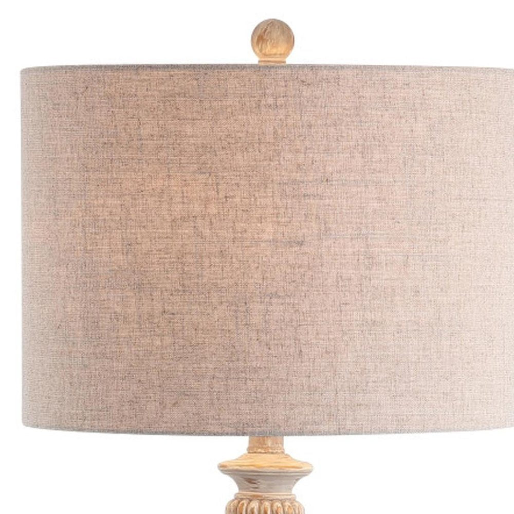 33" White Table Lamp With Drum Shade. Table lamp isolated on a plain white background, finished in white.