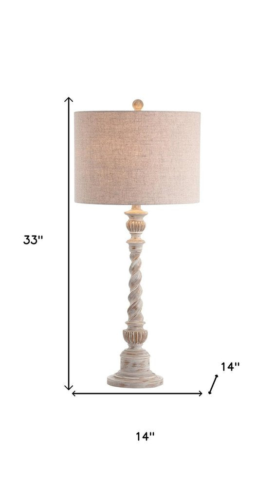 33" White Table Lamp With Drum Shade. Table lamp isolated on a plain white background, finished in white.