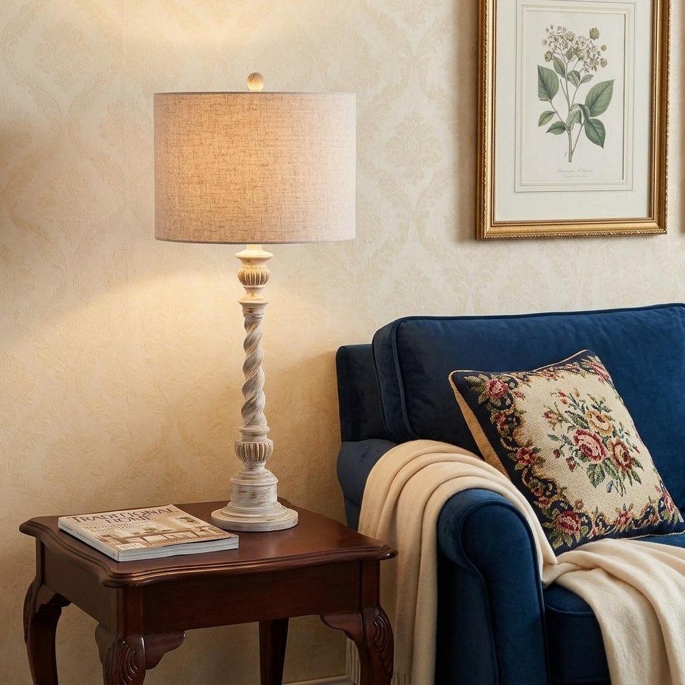 33" White Table Lamp With Drum Shade displayed on a tabletop in a furnished interior against a cream wall.