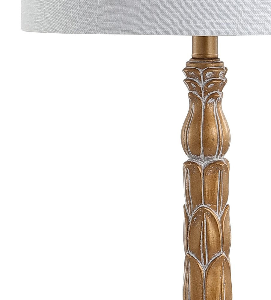 29" Antiqued Gold Table Lamp With Drum Shade. Table lamp isolated on a plain white background, showing its gold color.