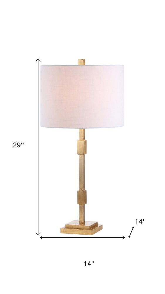 29" Gold Novelty Table Lamp With Globe Shade. Table lamp isolated on a plain white background, in a gold finish.