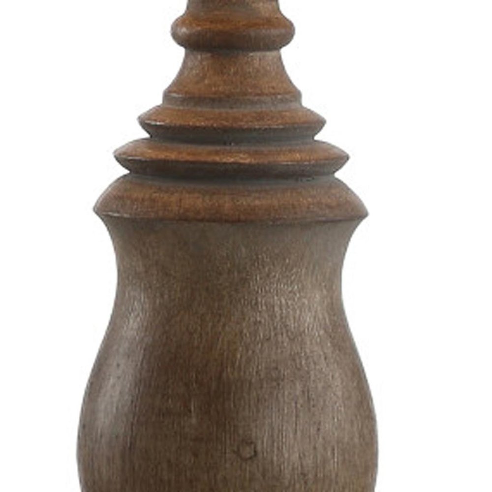 29" Brown Novelty Table Lamp With Globe Shade. Table lamp isolated on a plain white background, showing its brown color.