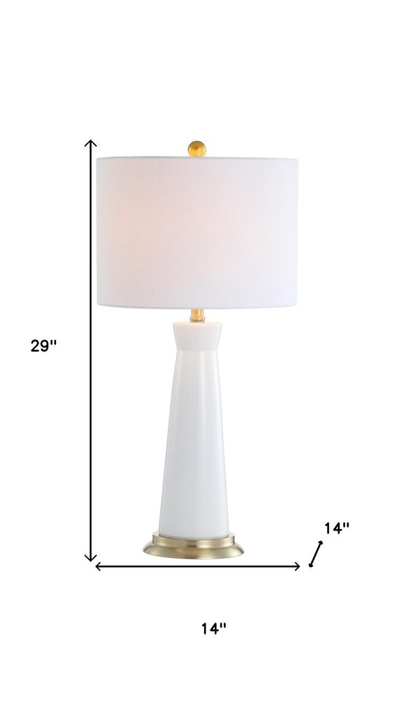 29" Gold Novelty Table Lamp With Globe Shade. Table lamp isolated on a plain white background.