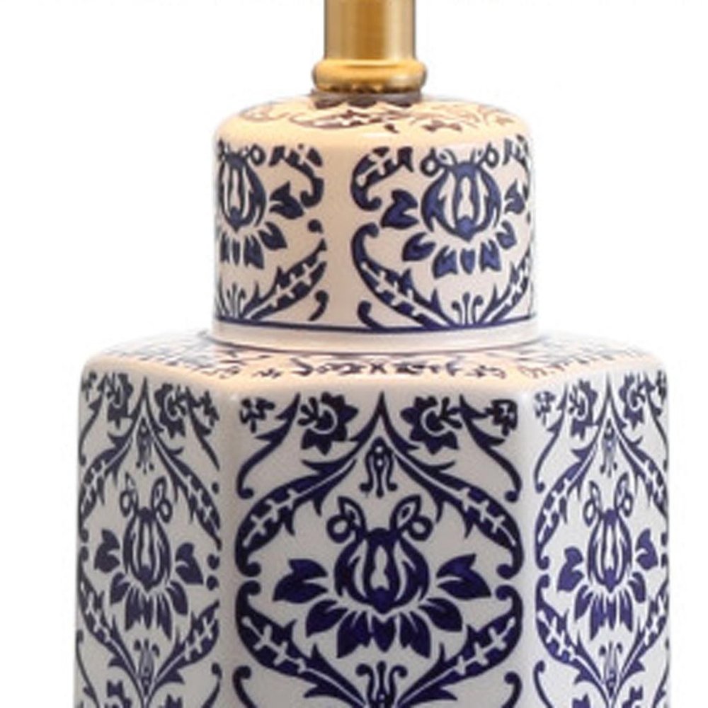24" Navy Blue Gold And White Table Lamp With Drum Shade. Table lamp isolated on a plain white background, finished in white.
