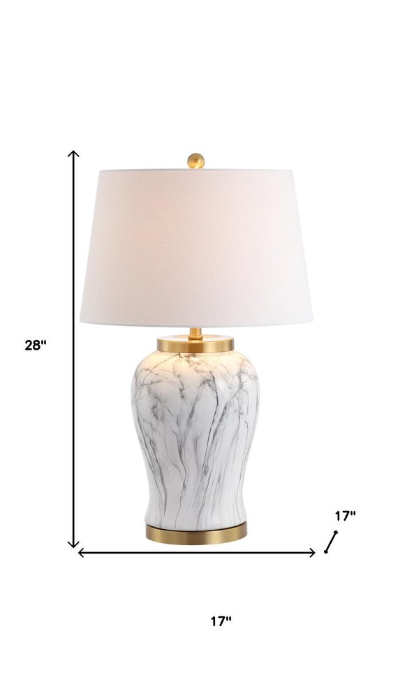 28" Gray White And Gold Urn Table Lamp With Empire Shade. Table lamp isolated on a plain white background, showing its white color.