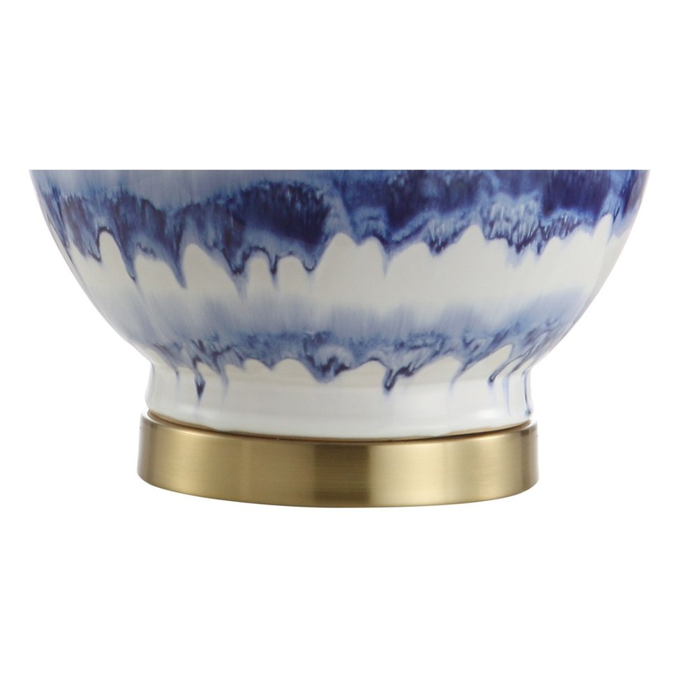 31" Blue White And Gold Novelty Table Lamp With Globe Shade. Table lamp isolated on a plain white background, in a blue finish.