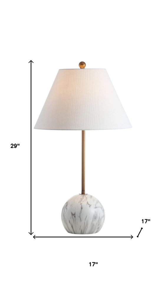 29" White Globe Table Lamp With Globe Shade. Table lamp isolated on a plain white background, showing its white color.