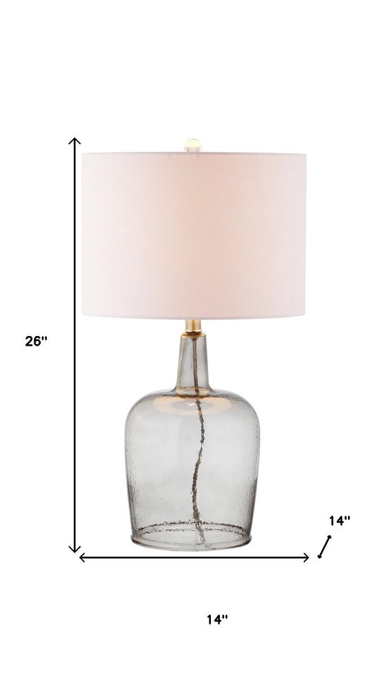26" Clear Urn Table Lamp With Drum Shade. Table lamp isolated on a plain white background, showing its clear color.