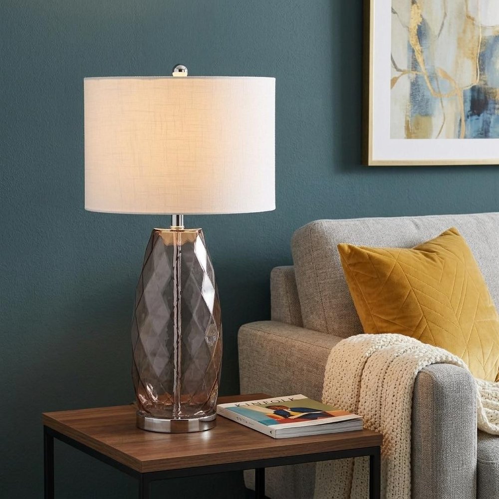 27" Silver Novelty Table Lamp With Drum Shade shown outdoors on an outdoor setting.